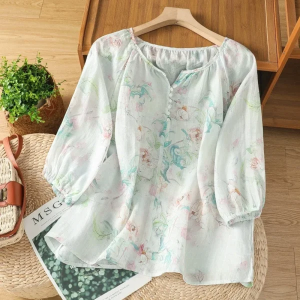 Áo Kiểu Nữ Cổ Tròn Xẻ V Họa Tiết Xanh Ngọc